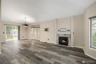 New fireplace with custom tile surround.