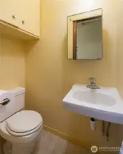 Powder room just a couple steps from the back door.