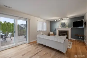 Family room in the rear of the home w/second back deck access.