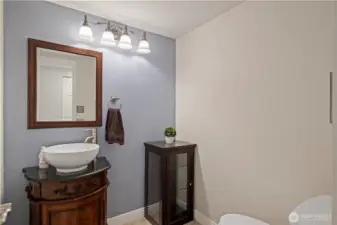 Main level powder room for family and guests.