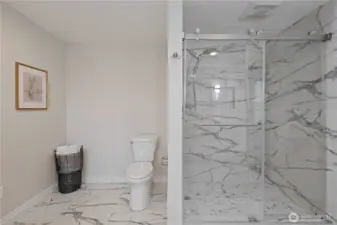 Plenty of room for additional storage, greenery, and more. And check out the size of that amazing shower!!