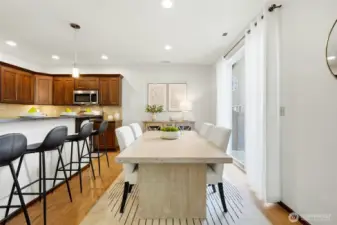 Large dining area that leads to the extra wide back patio