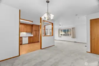 From dining room looking towards living room with kitchen on the left.