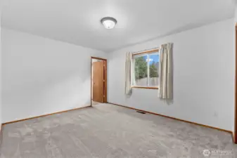 Primary bedroom looking towards bathroom.