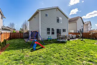 Extra space in the side yard! Shed stays too.