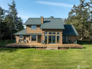 Light filled 3 bedroom 3.5 bath home with large waterfront deck.