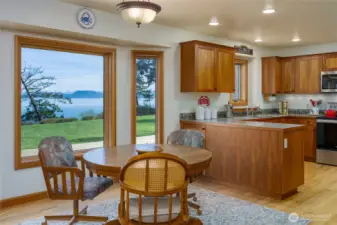 Enjoy your morning meal while watching Mt Baker peaking behind the fir tree.