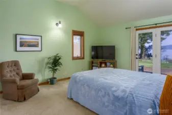 Another view of the primary bedroom.  The walk-in closet is to the left just out of sight.