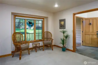 Another view of the den/office with front door to the right.