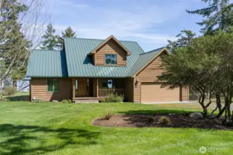 The welcoming front door with covered porch.