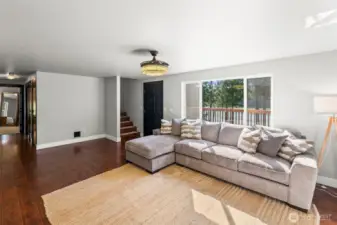Open living room with large windows for plenty of natural light