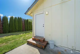 Door leading out of second bedroom to back yard and patio.
