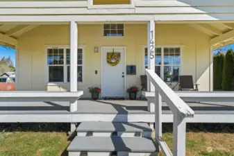 A welcoming covered front porch invites you into this sweet bungalow and all of its charm.