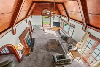 Looking down from upper attic balcony to the living room.