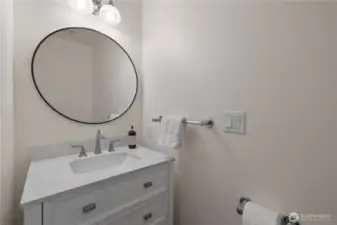1/2 bath next to bedroom off entry way