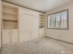 SPACIOUS FORTH BEDROOM ON MAIN FLOOR WITH MURPHY BED AND FOLD DOWN DESK.
