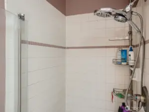 BEAUTIFULLY REMODELED MAIN FLOOR BATHROOM W/ SHOWER, NEXT TO DOWNSTAIRS BEDRM.