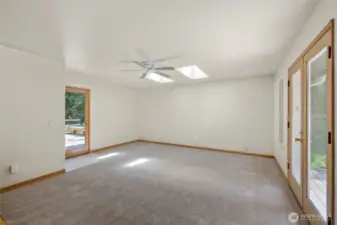 Rec room off kitchen, with doors to two deck areas!