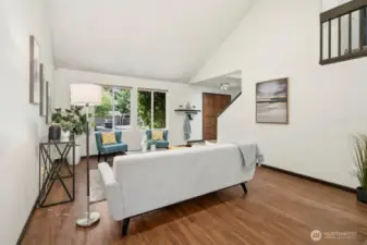 Note the lofted open hallway at upper right.