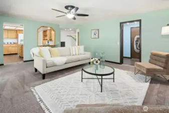 The informal living area is the perfect hub between the patio, kitchen and laundry room.