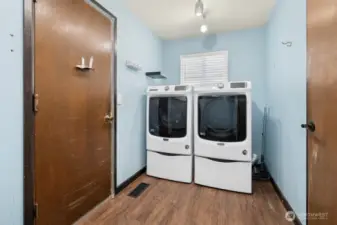 Newer Maytag washer and dryer! Door leads to the two car garage with 220 outlet for EV.