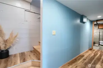 Basement view of stairs and utility room entrance