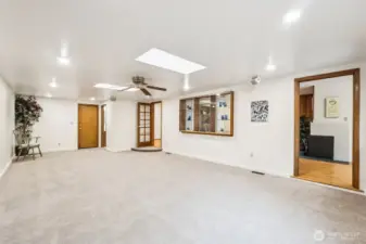 Extra large family room.  Access to the garage thru the door at the far end