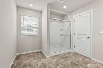 Photo is of a similar home. Colors and materials may vary.