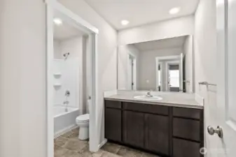 Photo is of a similar home. Colors and materials may vary.