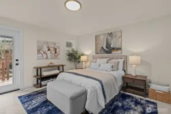 The primary bedroom is spacious, bright and airy, with brand new carpet just installed!