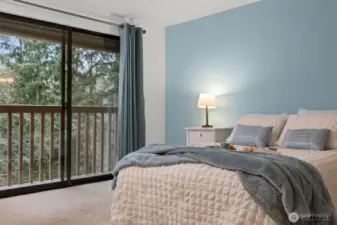 primary bedroom with deck