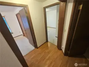 Two bedrooms off the main hallway.