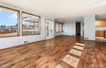 From far corner of Living room, back to Dining, Kitchen and entry