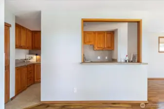 Pass-through from Kitchen to Dining - perfect for barstools and entertaining.