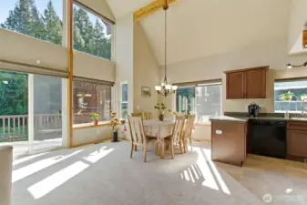Floor-to-ceiling windows bringing the outdoors in and showcasing the home’s iconic design.