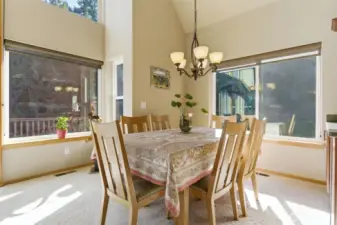 The overall feeling is expansive yet intimate — a gathering space designed for shared meals, conversation, and lingering evenings beneath high ceilings and warm light.