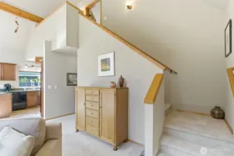 Convenient staircase brings you to the expansive primary bedroom with private viewing deck.