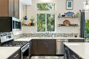 Stainless Steel appliances adds to the shine and lots of counter space.