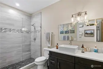 The Main Bathroom has Radiant heated floors as no one likes stepping out of a relaxing shower to cold floors!