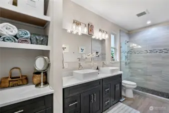 Great extra storage in this lovely Primary Bathroom with double sinks.