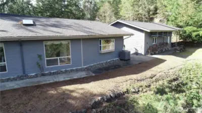 Aerial view of house and detached garage.