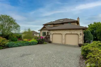 Big driveway, 2 car finished garage.