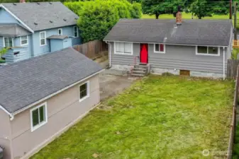 Large backyard for entertaining or possible expansion.