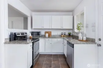 Newly refinished oak cabinets & granite countertops