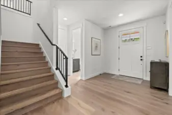 Grand entry with powder room conveniently located
