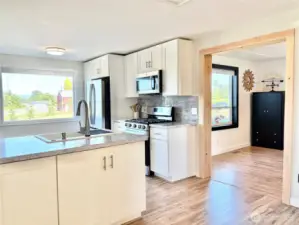 Kitchen leading into living room.