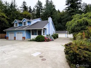 Say Yes to this address. Welcome to 7120 242nd St E, Graham, WA 98338. 3bedrooms, 2.5 bathrooms & 7 covered parking spaces. .295 acre private location. No HOA!. Private setting backs up to greenbelt