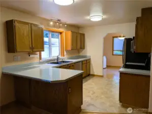 Say Yes to this address. Kitchen with stainless steel appliances. Welcome to #7120 242nd St E, Graham, WA 98338.