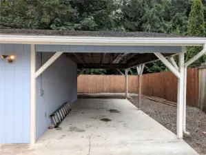 Lots of parking. 5 car detached covered parking plus 2 car attached garage. Say Yes to this address. #7120 242nd St E, Graham, WA 98338.