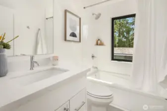 Full bathroom upstairs with heated floors